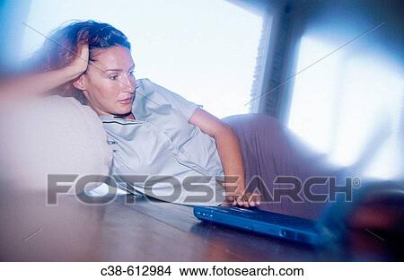 Woman with laptop computer View Large Photo Image Picture - Woman with laptop computer. Fotosearch
