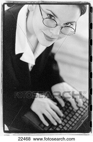 Woman with laptop View Large Photo Image Stock Photo - Woman with laptop. Fotosearch