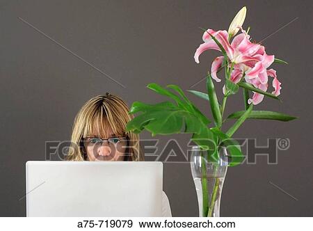 Woman with laptop View Large Photo Image Stock Photo - Woman with laptop. Fotosearch