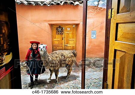 Woman with llama dressed on traditional dress, Cuzco, Peru. View Large Photo Image Stock Photograph - Woman with llama dressed on traditional dress, Cuzco, Peru.. Fotosearch