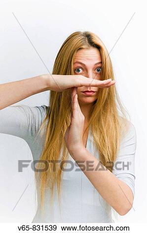 woman with long blonde hair making the T sign for? time out? with her hands View Large Photo Image Stock Photo - woman with long blonde hair making the T sign for? time out? with her hands. Fotosearch