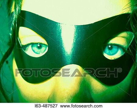Stock Photo - Woman with mask. Fotosearch