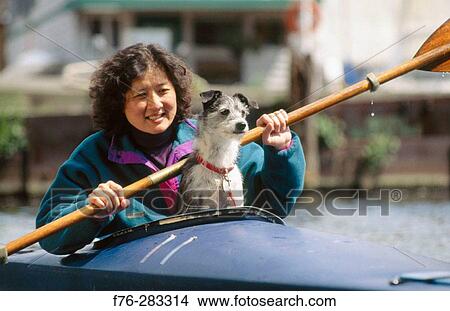 Woman with mixed breed Terrier View Large Photo Image Picture - Woman with mixed breed Terrier. Fotosearch