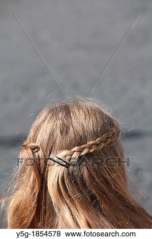woman with plaits in long hair View Large Photo Image Stock Photo - woman with plaits in long hair. Fotosearch