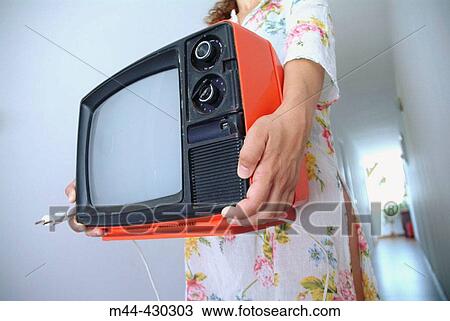 Woman with red television. View Large Photo Image Stock Image - Woman with red television.. Fotosearch