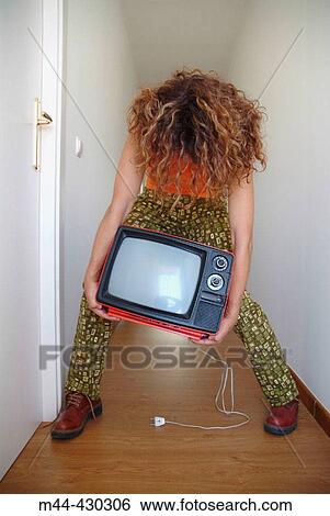 Woman with red television. View Large Photo Image Stock Photograph - Woman with red television.. Fotosearch