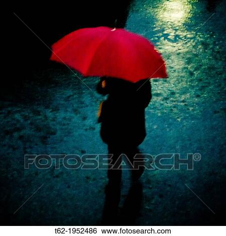 Woman with red umbrella in the rain in winter. View Large Photo Image Stock Photograph - Woman with red umbrella in the rain in winter.. Fotosearch
