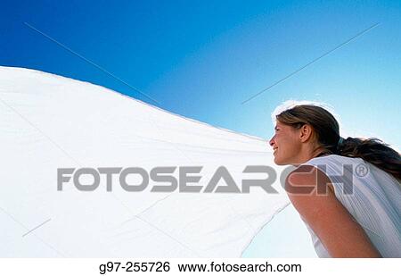 Woman with sail View Large Photo Image Stock Photograph - Woman with sail. Fotosearch