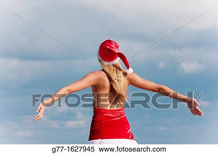 Woman with Santa's hat on the beach, Miami, Florida, USA View Large Photo Image Stock Photography - Woman with Santa's hat on the beach, Miami, Florida, USA. Fotosearch