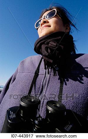 Woman with scarf and binoculars. Alaska. United States View Large Photo Image Stock Photo - Woman with scarf and binoculars. Alaska. United States. Fotosearch