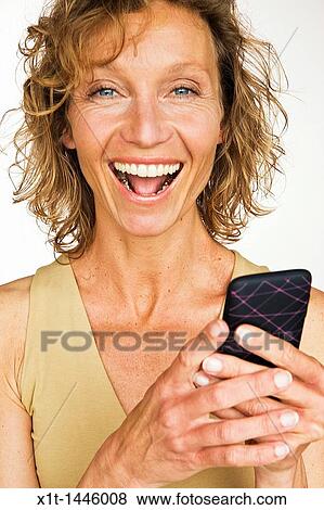 Woman with smartphone View Large Photo Image Stock Photo - Woman with smartphone. Fotosearch