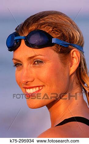 woman with swim goggles on her head View Large Photo Image Picture - woman with swim goggles on her head. Fotosearch