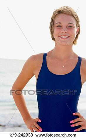Woman with Swimsuit on Beach Smiling View Large Photo Image Stock Photo - Woman with Swimsuit on Beach Smiling. Fotosearch
