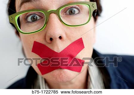 Woman with tape over mouth View Large Photo Image Stock Photography - Woman with tape over mouth. Fotosearch