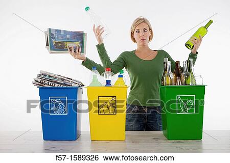 Woman with three arms recycling View Large Photo Image Stock Photograph - Woman with three arms recycling. Fotosearch