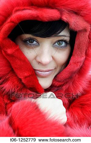 Woman with two different colored eyes and red coat Heterochromia iridium View Large Photo Image Stock Photo - Woman with two different colored eyes and red coat Heterochromia iridium. Fotosearch