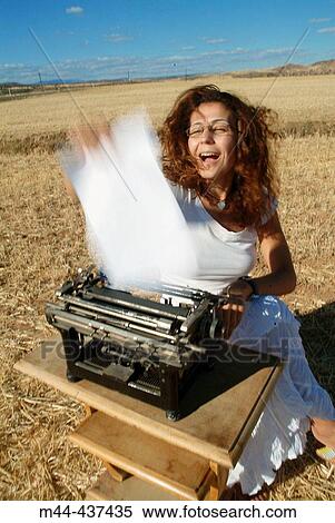 Woman with typewriter View Large Photo Image Stock Photography - Woman with typewriter. Fotosearch