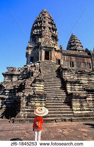 Woman with Umbrella outside of the World's Largest Temple Angkor Wat Siem Reap Cambodia View Large Photo Image Stock Image - Woman with Umbrella outside of the World's Largest Temple Angkor Wat Siem Reap Cambodia. Fotosearch