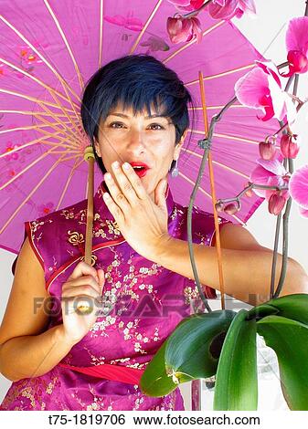 Stock Photograph - Woman with umbrella. Fotosearch