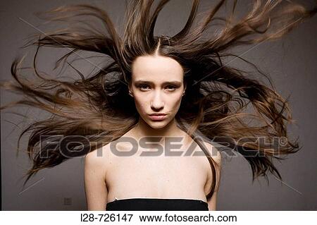 Woman With Windswept Hair View Large Photo Image Stock Photo - Woman With Windswept Hair. Fotosearch