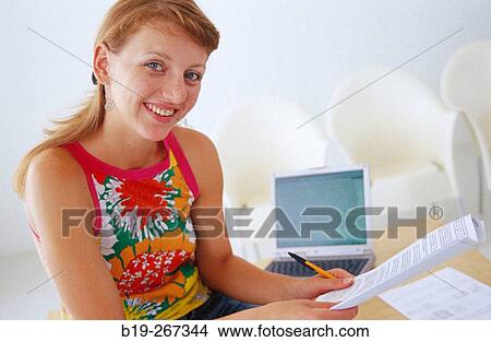 Woman working in the office View Large Photo Image Picture - Woman working in the office. Fotosearch