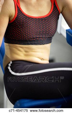 woman working out abs in gym View Large Photo Image Stock Photography - woman working out abs in gym. Fotosearch