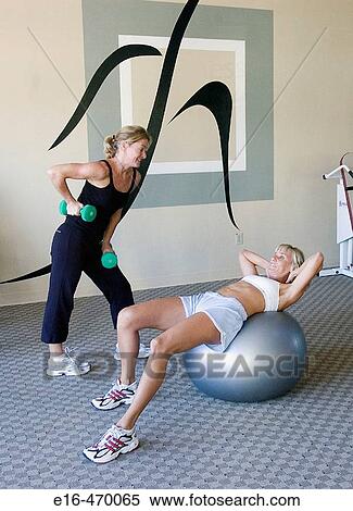 woman working out at gym View Large Photo Image Stock Photography - woman working out at gym. Fotosearch