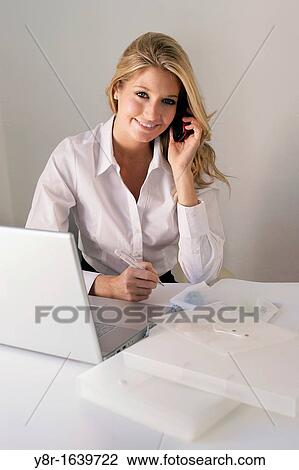 Stock Image - woman working. Fotosearch