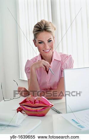 Stock Photography - woman working. Fotosearch
