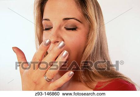 Woman yawning View Large Photo Image Stock Image - Woman yawning. Fotosearch