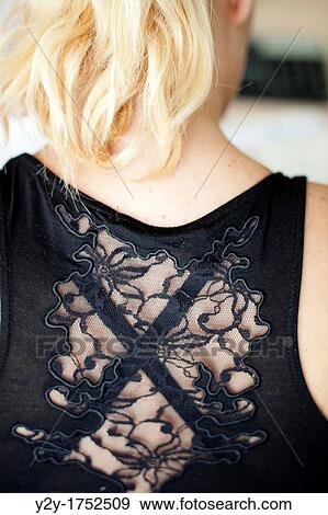 Woman's back with lace shirt View Large Photo Image Stock Photo - Woman's back with lace shirt. Fotosearch