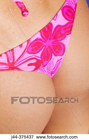 Woman's behind in bathing suit View Large Photo Image Stock Photo - Woman's behind in bathing suit. Fotosearch