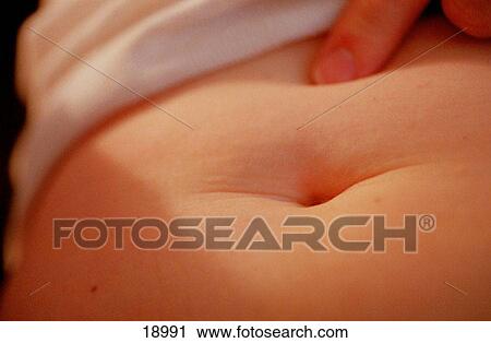 Woman's bellybutton View Large Photo Image Stock Image - Woman's bellybutton. Fotosearch