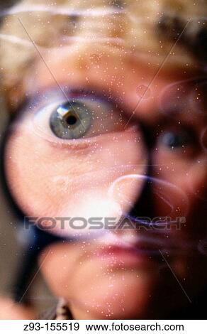 Woman's distorted face and eye View Large Photo Image Stock Photo - Woman's distorted face and eye. Fotosearch