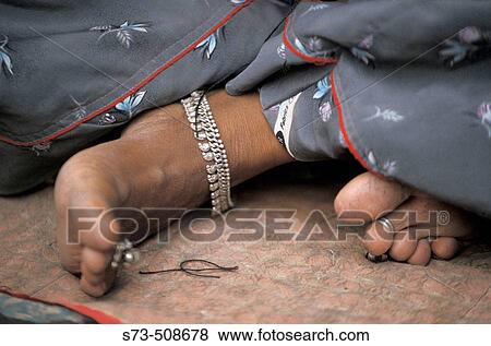 Stock Photo - Woman's foot, New Delhi. India. Fotosearch