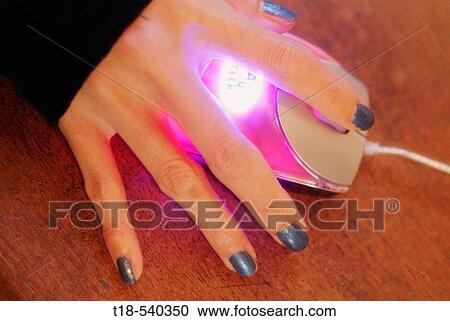 woman's hand holding mouse View Large Photo Image Stock Image - woman's hand holding mouse. Fotosearch
