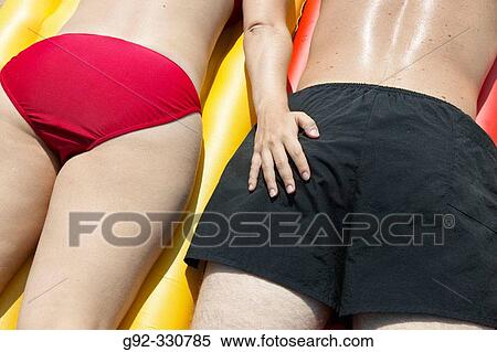 Woman's hand on man's bottom. Sk? ne. Sweden View Large Photo Image Stock Photography - Woman's hand on man's bottom. Sk? ne. Sweden. Fotosearch