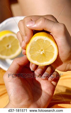 Woman's hand with lemon View Large Photo Image Stock Image - Woman's hand with lemon. Fotosearch