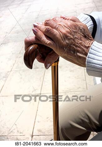 Woman's hands on cane View Large Photo Image Stock Image - Woman's hands on cane. Fotosearch