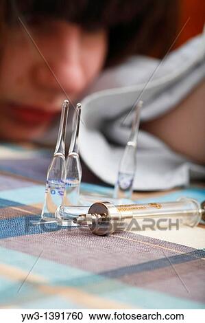 women and drags syringe on the table View Large Photo Image Stock Image - women and drags syringe on the table. Fotosearch