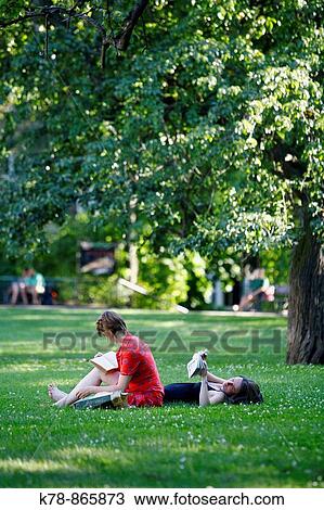 Stock Image - women at Kampa Park, Mala Strana, Prague, Czech Republic. Fotosearch