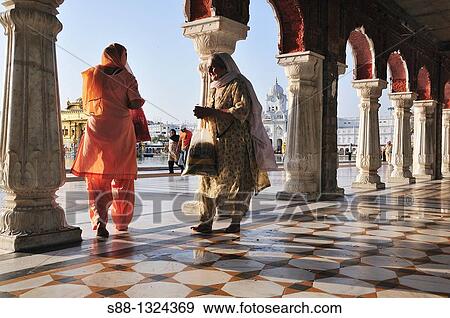 Women at the Golden temple View Large Photo Image Stock Photo - Women at the Golden temple. Fotosearch