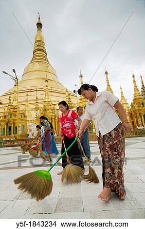 Women brooming Shwedagon pagoda's floor View Large Photo Image Picture - Women brooming Shwedagon pagoda's floor. Fotosearch