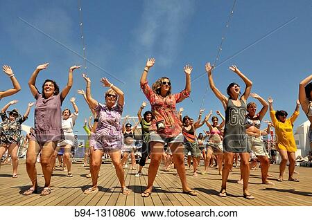 Women dancing on deck of cruise ship View Large Photo Image Stock Photograph - Women dancing on deck of cruise ship. Fotosearch