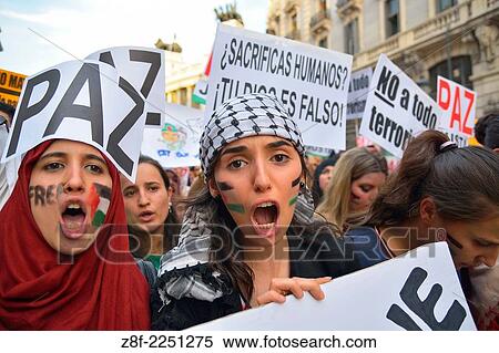 Stock Photography - Women demanding peace and protesting against Israeli attacks in the Gaza Strip during a demonstration in Madrid on July 18, 2014. Madrid. Spain.. Fotosearch