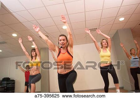 Women doing exercise at the gym View Large Photo Image Stock Photography - Women doing exercise at the gym. Fotosearch