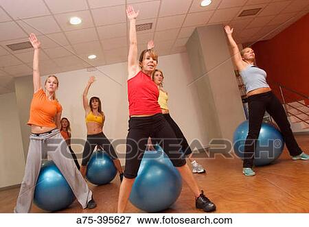 Women doing pilates View Large Photo Image Stock Photo - Women doing pilates. Fotosearch