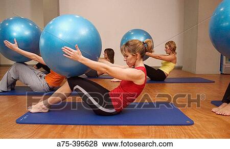Women doing pilates View Large Photo Image Stock Photo - Women doing pilates. Fotosearch