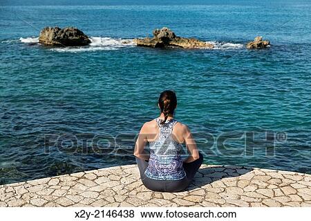 Women doing yoga, Negril, Jamaica. View Large Photo Image Stock Photo - Women doing yoga, Negril, Jamaica.. Fotosearch