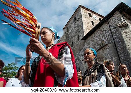 Women dressed in traditional costume playing the tambourine in front of the Basilica of Llanes. Asturias. Spain. View Large Photo Image Stock Image - Women dressed in traditional costume playing the tambourine in front of the Basilica of Llanes. Asturias. Spain.. Fotosearch